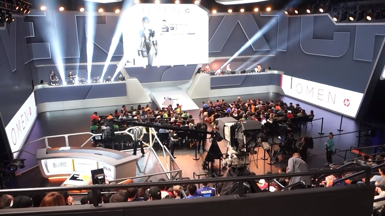 Audience and player desks inside Blizzard Arena during an Overwatch competition