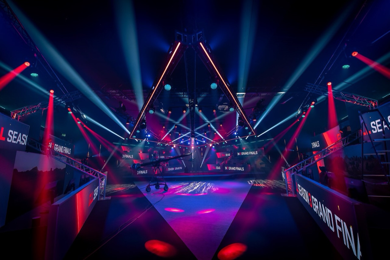 Empty red and blue PUBG esports grand final stage prepared for broadcast