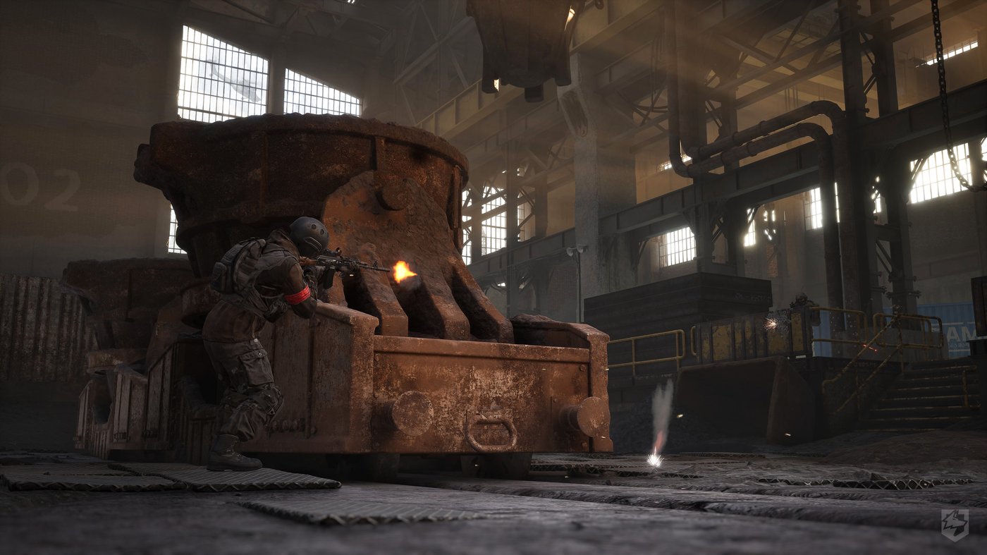 Publisher screenshot of an industrial battlefield in WARDOGS