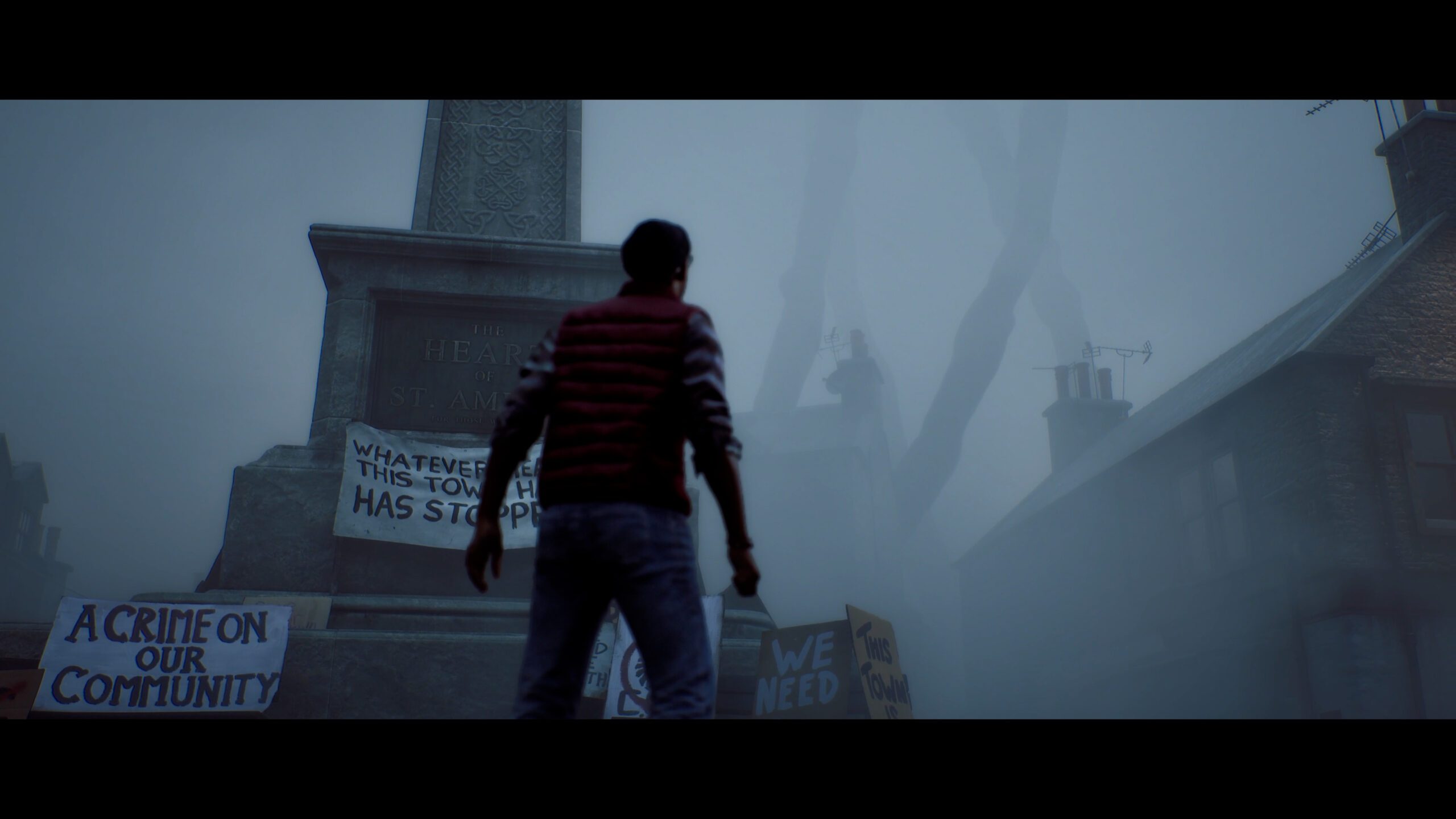 Simon approaches the fogbound St Amelia memorial in Silent Hill Townfall