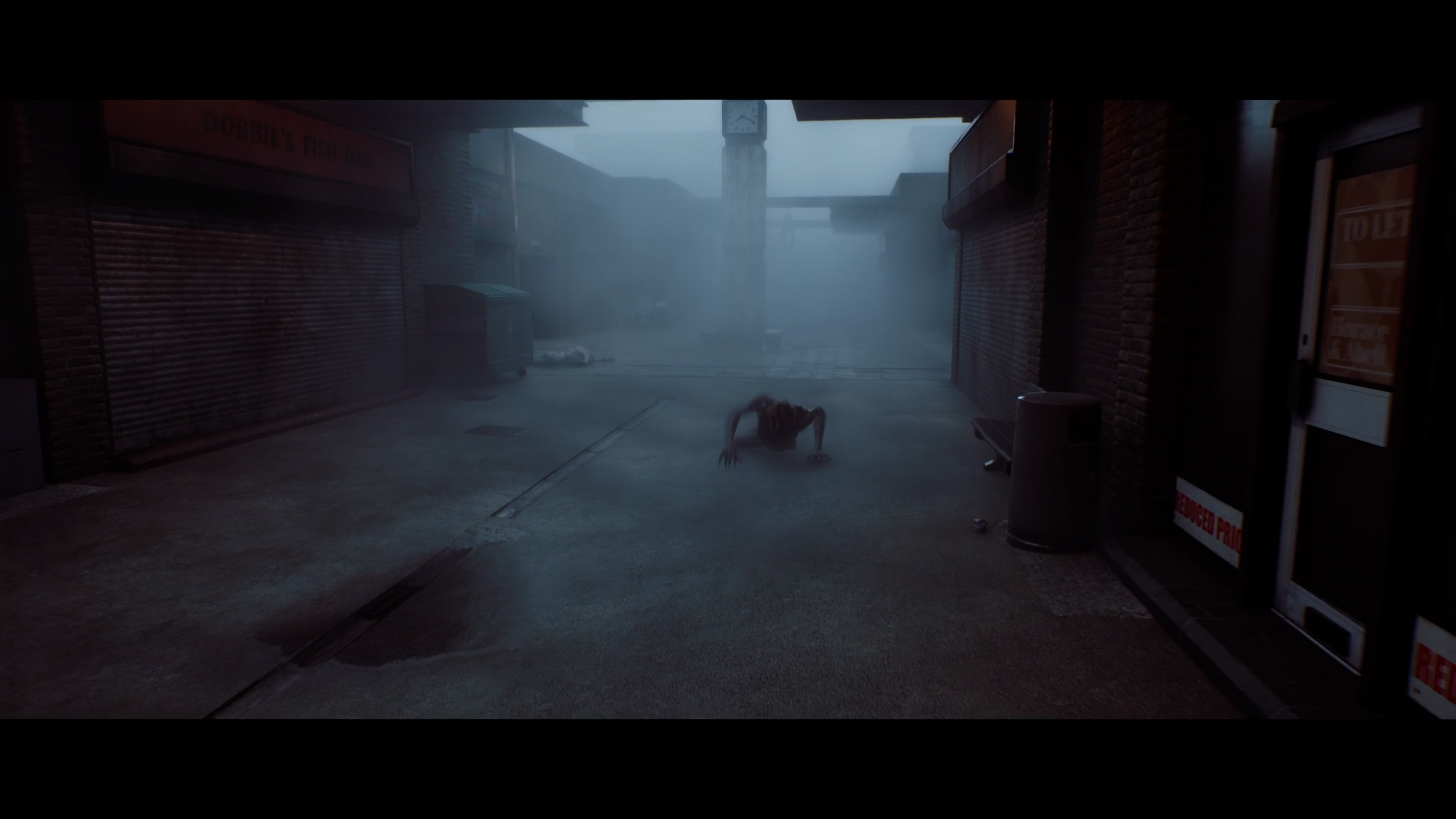 A creature crawls toward Simon on a foggy St Amelia street in Silent Hill Townfall